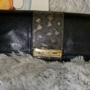 See By Chloe Leather by a wallet